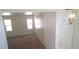 A bright bedroom with neutral walls and carpeted floor, offering natural light from windows at 3883 Winter Whitetail St, Las Vegas, NV 89122