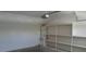 Spacious garage featuring shelving and water heater at 3883 Winter Whitetail St, Las Vegas, NV 89122