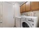 This laundry room offers modern washer and dryer at 3994 Ridgewood Ave, Las Vegas, NV 89120