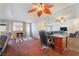 Living room featuring a work station and mirrors on the wall at 3994 Ridgewood Ave, Las Vegas, NV 89120