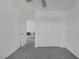 Cozy bedroom with neutral carpet and attached sitting room area at 406 Misterioso St, Henderson, NV 89011