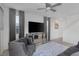 Cozy living room with plush seating, modern entertainment center, and contemporary decor at 406 Misterioso St, Henderson, NV 89011