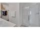 Main bathroom features a glass-enclosed shower and a walk-in closet at 406 Misterioso St, Henderson, NV 89011