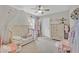 Cozy bedroom with a ceiling fan, window and ample natural light at 4163 Peaceful Meadow St, Las Vegas, NV 89135