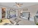 Bedroom featuring a ceiling fan and access to a large walk-in closet at 4163 Peaceful Meadow St, Las Vegas, NV 89135