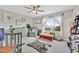Bedroom boasts a ceiling fan, window, and space for play and relaxation at 4163 Peaceful Meadow St, Las Vegas, NV 89135