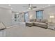 Cozy upstairs living area with comfortable seating and plenty of natural light at 4163 Peaceful Meadow St, Las Vegas, NV 89135
