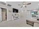 Second story living area with television, storage, and access to the bedrooms at 4163 Peaceful Meadow St, Las Vegas, NV 89135