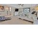 Tranquil bedroom featuring a ceiling fan, carpet, and natural light at 4163 Peaceful Meadow St, Las Vegas, NV 89135