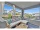 Comfortable covered patio with outdoor furniture and neighborhood views at 4163 Peaceful Meadow St, Las Vegas, NV 89135