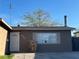 The property features a well-maintained exterior with a security door and a neatly kept front entrance at 4321 Mayflower Ln, Las Vegas, NV 89107