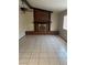 Room showcasing a brick fireplace with a raised hearth and a decorative mantle at 4321 Mayflower Ln, Las Vegas, NV 89107