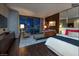 Contemporary bedroom boasts modern decor, chic furniture, and stunning views of the cityscape at 4381 W Flamingo Rd # 24304, Las Vegas, NV 89103