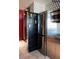 Stainless steel refrigerator with custom matching cabinetry at 4381 W Flamingo Rd # 24304, Las Vegas, NV 89103