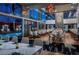 Elegant restaurant with pool access, featuring modern decor, a fireplace, and ample seating for guests at 4381 W Flamingo Rd # 24304, Las Vegas, NV 89103