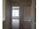 Hallway view into rooms filled with natural light at 4732 Lone Grove Dr, Las Vegas, NV 89139