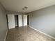 Bedroom with neutral paint, tiled floors and a closet at 500 S 13Th St # C27, Las Vegas, NV 89101