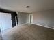 Living room featuring neutral-toned walls and tiled floor, illuminated by ceiling light at 500 S 13Th St # C27, Las Vegas, NV 89101