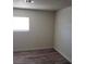 Bright bedroom featuring updated floors and natural light from window at 5126 Golden Ln # A, Las Vegas, NV 89119