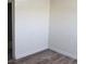 Neutral bedroom featuring updated floors and white trim at 5126 Golden Ln # A, Las Vegas, NV 89119