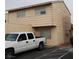 Two story home with light colored exterior and white truck in the driveway at 5126 Golden Ln # A, Las Vegas, NV 89119