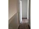 Hallway with contemporary flooring and neutral walls at 5126 Golden Ln # A, Las Vegas, NV 89119