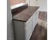 Close up of kitchen bar top with light countertops and cabinets at 5126 Golden Ln # A, Las Vegas, NV 89119