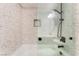 Shower-tub combination featuring modern shower fixtures and tiled walls at 5537 Sentinel Bridge St, Las Vegas, NV 89130