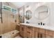 Contemporary bathroom featuring a double sink vanity, tiled shower with glass door, and modern fixtures at 5537 Sentinel Bridge St, Las Vegas, NV 89130