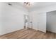 Spacious bedroom with walk-in closet, ensuite bathroom, and modern floors at 5537 Sentinel Bridge St, Las Vegas, NV 89130