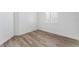 Bright bedroom features stylish window shutters and wood-style flooring at 5537 Sentinel Bridge St, Las Vegas, NV 89130