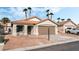 Charming single-story home with a low-pitched tile roof and desert landscaping at 5537 Sentinel Bridge St, Las Vegas, NV 89130
