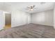 Large main bedroom with neutral carpet and an ensuite bathroom at 6033 Torciano St, North Las Vegas, NV 89081