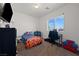 Bedroom with carpet, a window, and a desk at 6101 Cavalry Trl, Pahrump, NV 89060