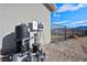 View of the pool equipment with mountain views and backyard fencing at 6101 Cavalry Trl, Pahrump, NV 89060