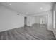 Empty bedroom featuring ample natural light and a mirrored closet, providing a blank canvas for personalization at 6109 W Oakey Blvd # C, Las Vegas, NV 89146