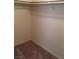 Organized closet with shelving and space for clothing storage at 6119 Magic Mesa St, North Las Vegas, NV 89031