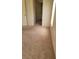This bedroom has neutral walls and plush carpeting at 6425 Extreme Shear Ave # 101, Henderson, NV 89011