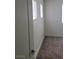 This bedroom has neutral walls, plush carpeting, and a window for ample natural light at 6425 Extreme Shear Ave # 101, Henderson, NV 89011