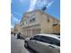 Two-story townhome featuring stucco exterior, two-car garage, and satellite dish on facade at 6425 Extreme Shear Ave # 101, Henderson, NV 89011