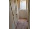 Hallway features closets and a window providing natural light at 6425 Extreme Shear Ave # 101, Henderson, NV 89011