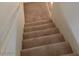 Carpeted staircase in neutral tones at 6425 Extreme Shear Ave # 101, Henderson, NV 89011