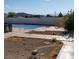 Backyard with pool, concrete patio and landscaping at 664 Sky Rd, Indian Springs, NV 89018