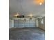 Spacious two car garage with ample lighting at 664 Sky Rd, Indian Springs, NV 89018