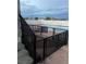 A refreshing pool area fenced for safety at 664 Sky Rd, Indian Springs, NV 89018