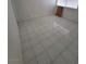 Bedroom featuring neutral walls and tile flooring, lit by a window at 6733 E Carey Ave, Las Vegas, NV 89156
