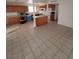 Open kitchen with wooden cabinets and a center island for casual dining at 6733 E Carey Ave, Las Vegas, NV 89156