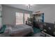 Cozy bedroom with natural light, closet, and ample space for relaxation and personalization at 6924 Ghost Ranch Ave, Las Vegas, NV 89179