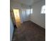 A bedroom with neutral walls, carpet flooring, and a built in closet space at 731 Emerald Idol Pl, Henderson, NV 89011