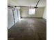Spacious two-car garage with an automatic door and ample space for parking and storage at 731 Emerald Idol Pl, Henderson, NV 89011